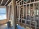 Framing of a staircase and exposed ductwork in the renovation project at 110 Dahlia Nw Ave, Atlanta, GA 30314