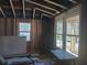 Interior of room under construction, framing a view of the street at 110 Dahlia Nw Ave, Atlanta, GA 30314