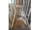 Image of a newly constructed staircase leading to a framed basement area at 110 Dahlia Nw Ave, Atlanta, GA 30314