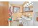 Bathroom with updated vanity, toilet, and shower-tub combination at 1868 Fort Valley Sw Dr, Atlanta, GA 30311