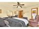 Bright bedroom with hardwood floors and sitting area at 1868 Fort Valley Sw Dr, Atlanta, GA 30311