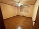 Bedroom with hardwood floors and ceiling fan at 1868 Fort Valley Sw Dr, Atlanta, GA 30311
