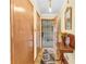 Inviting entryway with hardwood floors, a console table, and a decorative rug at 1868 Fort Valley Sw Dr, Atlanta, GA 30311