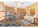 Comfortable living area featuring wooden floors, neutral paint, and natural lighting at 1868 Fort Valley Sw Dr, Atlanta, GA 30311