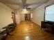 View of the living room featuring beautiful hardwood floors and a ceiling fan at 1868 Fort Valley Sw Dr, Atlanta, GA 30311
