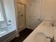 Bathroom with double vanity, tub and separate shower at 233 Bloomfield Cir, Canton, GA 30114