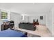 Finished basement with tile flooring, desk area, and comfortable seating at 2799 Briarglen Dr, Atlanta, GA 30340