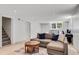 Finished basement with tile flooring and a comfortable seating area at 2799 Briarglen Dr, Atlanta, GA 30340