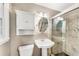 Updated bathroom featuring a tiled shower, vanity, and modern fixtures at 2799 Briarglen Dr, Atlanta, GA 30340