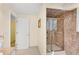 Updated bathroom featuring tiled stand up shower with glass door at 2799 Briarglen Dr, Atlanta, GA 30340