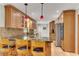Well-equipped kitchen featuring custom cabinets, granite countertops, and stainless steel appliances at 2799 Briarglen Dr, Atlanta, GA 30340