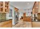 Eat-in kitchen with granite countertops, stainless steel appliances, custom wood cabinets and an island at 2799 Briarglen Dr, Atlanta, GA 30340