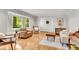Bright and airy living room with hardwood floors, neutral paint colors, and abundant natural light at 2799 Briarglen Dr, Atlanta, GA 30340