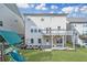 Beautiful home back exterior with a second story deck and nice backyard at 667 Creswell Park, Smyrna, GA 30082