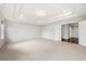 Spacious main bedroom suite featuring a tray ceiling and plush carpeting at 667 Creswell Park, Smyrna, GA 30082