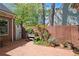 Private brick patio with garden area providing a tranquil outdoor space at 1817 Bedfordshire Dr, Decatur, GA 30033