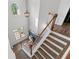 Spacious foyer with a wooden staircase and lots of natural light at 235 South St, Buford, GA 30518
