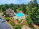 Stunning community pool area with a waterslide, splash pad, and seating for a relaxing summer day at 2553 Twilight Vw, Snellville, GA 30078