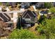 The home has a large deck, beautifully landscaped yard, and mature trees providing privacy and shade at 2553 Twilight Vw, Snellville, GA 30078