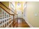 Grand two-story foyer with hardwood floors, staircase, chandelier and abundant natural light at 2553 Twilight Vw, Snellville, GA 30078