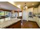 Bright kitchen boasts granite countertops, ample cabinetry and stainless steel appliances at 2553 Twilight Vw, Snellville, GA 30078