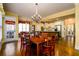 Open concept kitchen and dining area with lots of natural light and hardwood floors at 2553 Twilight Vw, Snellville, GA 30078