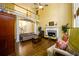 Bright living room boasts high ceilings, fireplace, hardwood flooring and natural light at 2553 Twilight Vw, Snellville, GA 30078