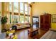 Open concept living room with floor to ceiling windows for ample natural light and hardwood floors at 2553 Twilight Vw, Snellville, GA 30078