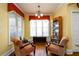 Cozy sitting area features comfortable armchairs and a window with natural light at 2553 Twilight Vw, Snellville, GA 30078