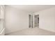 Well-lit bedroom with closet, window and plush carpet at 310 Silver Moon Drive # 111, Loganville, GA 30052