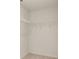 Walk-in closet equipped with metal shelving for optimal storage space at 310 Silver Moon Drive # 111, Loganville, GA 30052