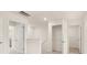 Open hallway with view of staircase, entryway, and open closet at 310 Silver Moon Drive # 111, Loganville, GA 30052