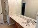 A bathroom featuring a white sink with a marble-patterned countertop at 999 Grassdale Rd, Cartersville, GA 30121