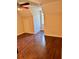 A bedroom featuring hardwood floors, a window, and neutral-colored walls at 999 Grassdale Rd, Cartersville, GA 30121