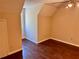 A bedroom featuring hardwood floors, a ceiling fan, and neutral-colored walls at 999 Grassdale Rd, Cartersville, GA 30121