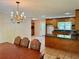 Open concept kitchen with a breakfast bar area and oak cabinetry at 999 Grassdale Rd, Cartersville, GA 30121