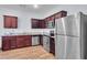 Modern kitchen boasting stainless steel appliances and granite countertops, ideal for cooking at 1929 Millstream Holw, Conyers, GA 30012