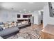 Open-concept living space with modern furnishings, stainless steel appliances and stylish decor at 1929 Millstream Holw, Conyers, GA 30012