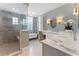 Elegant bathroom with marble counters, a glass shower, and a standalone tub at 22 The Prado Ne, Atlanta, GA 30309