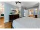 Comfortable bedroom showcasing blue walls, hardwood floors, and dark wood furniture at 22 The Prado Ne, Atlanta, GA 30309