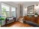Cozy entryway with wooden bench, hardwood floors, and decorative furniture at 22 The Prado Ne, Atlanta, GA 30309