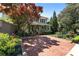 Charming home with a brick driveway, landscaped yard, and inviting front porch at 22 The Prado Ne, Atlanta, GA 30309