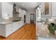 Stylish kitchen boasts stainless appliances, granite counters and hardwood floors at 22 The Prado Ne, Atlanta, GA 30309