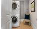 Convenient laundry room features stacked washer and dryer unit at 22 The Prado Ne, Atlanta, GA 30309