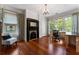 Bright and airy office space featuring large windows, hardwood floors, and a vintage fireplace at 22 The Prado Ne, Atlanta, GA 30309