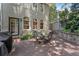 Inviting brick patio with outdoor seating, perfect for relaxing and entertaining guests outside at 22 The Prado Ne, Atlanta, GA 30309