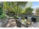 Tranquil brick patio with water feature and seating area offers an ideal spot for outdoor enjoyment at 22 The Prado Ne, Atlanta, GA 30309