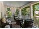Cozy covered porch featuring comfortable seating, stylish décor, and a tranquil outdoor living space at 22 The Prado Ne, Atlanta, GA 30309