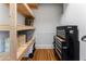 Basement Storage with wooden shelves and a toolbox for organization at 22 The Prado Ne, Atlanta, GA 30309