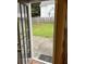 View of backyard through glass door at 2347 Fawn Hollow Ct, Duluth, GA 30096